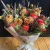 Celebrate the warmth of the season with this bouquet that captures cozy