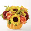 This Thanksgiving arrangement is both elegant and festive, designed to bring warmth