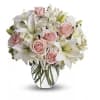 This is a timeless vase arrangement that speaks of grace and tenderness.