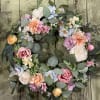 Bring a fun look indoors with a gorgeous grapevine accented in roses