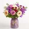 About Alluring Beauty&trade; Bouquet
NEW From its variety of blooms to its eye-catching