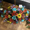 Cemetery saddle in color scheme of summertime . Medium size. Silk flowers.