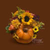 Celebrate the warmth of autumn with this festive pumpkin arrangement! Bursting with