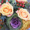 A wonderful mix of all fall has to offer-berries, cabbage, mums and