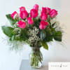 Dozen hot pink roses in a vase. 

Standard: 12 roses
Deluxe: 18 roses
Premium: