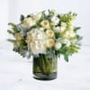 Find comfort in the Linen Solace, a refined sympathy floral arrangement designed