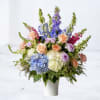 The Reverie Tribute is a breathtaking floral arrangement that beautifully blends tradition