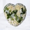 The Tender Remembrance Heart is a stunning sympathy tribute, crafted with ivory