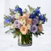 Delicate and refined, the Lilac Skies Bouquet features a graceful pairing of