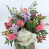 This enchanting bouquet features an exquisite combination of pink roses, white hydrangeas
