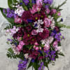 Console and comfort with this luxurious spray of lavender roses, alstroemeria and