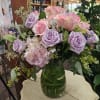 This softly elegant gesture of condolence and affection honoring the memory of