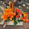 - 3 Orange Lilies
- 6 Orange Roses
- 3 Fall Cushions
- Dusty Millers
-