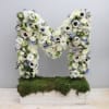Completely custom flower letters or numbers. We need a 24 HOUR NOTICE.