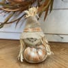 Add a special harvest festival charm to your decorations with this Happy