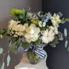 A beautifully selected bunch of the freshest flowers in a vase uniquely