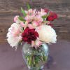 Cute little arrangement with bright colored flowers. Nice and compact for a