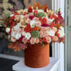 Brighten any space with our Elegant Flower Fall Box Arrangement! Bursting with