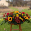 Designer&#039;s Choice fresh fall blooms in festive tones for your holiday table.
Features