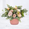 Petal Canopy is a soft, garden-inspired floral arrangement designed with natural movement
