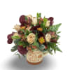 Celebrate cozy autumn vibes with this charming arrangement in a seasonal mug