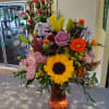 Autumn color glass vase adds beauty to this classic fall elegant bouquet.