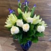 Elegant arrangement including Lilies and Roses
