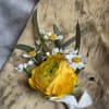 Each boutonniere is crafted as a small work of art&mdash;organic, nature-inspired, and