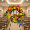 Honor a loved one with our Celebration of Life Sympathy Wreath, a