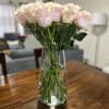 Beautiful vase of 25 roses (if you want a different color you