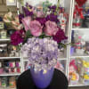 fresh flowers in purple vase 