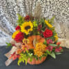 A handpicked selection of a variety of beautiful, fall toned fresh flowers