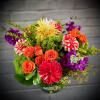 A beautiful array of Fall jewel tone flowers, including locally grown Dahlias
