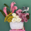 Gingers, scabiosas different and beautiful flowers make this compact beautiful arrangement an