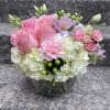 This arrangement is in a 8 inch bubble bowl filled with hydrangeas