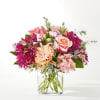 A delectable blend of berry shades make this a beautiful arrangement to
