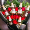 Bouquet de rosas rojas y bebidas alcoholicas.