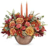 Joyfully welcome the harvest season with this magnificent centerpiece of fall blooms