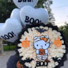 Buchon de 50 rosas blancas y decoracion de hello kitty tipo halloween