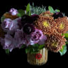 Lavender, purple and copper tones in a bamboo lined glass vase.
Approximate measurements