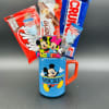 Adorable gift arrangement,  mug accompanied by a variety of chocolates and