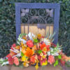 Nothing dresses up a Thanksgiving table like a fresh harvest centerpiece. Lilies