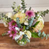 Variety of chrysanthemums, daisies, roses (garden roses when available) and other seasonal