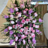 A graceful expression of love and remembrance, this standing spray is designed