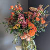 A beautifully selected bunch of the freshest flowers in a vase uniquely