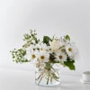 Let the breeze run through the white roses and eucalyptus for an