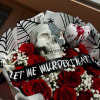 Enjoy this beautifully wrapped dozen red roses with baby&#039;s breath in spider