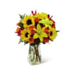 Sunflowers, lilies, and roses make a statement at this time of year!