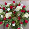 A dramatic contrast of brilliant red and tranquil white flowers expresses the