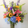 A mix of vibrant colors in the arrangement will brighten anyone&#039;s day.